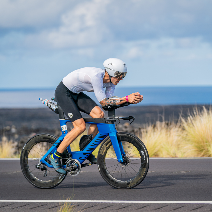 Cyclist riding a bike on a road